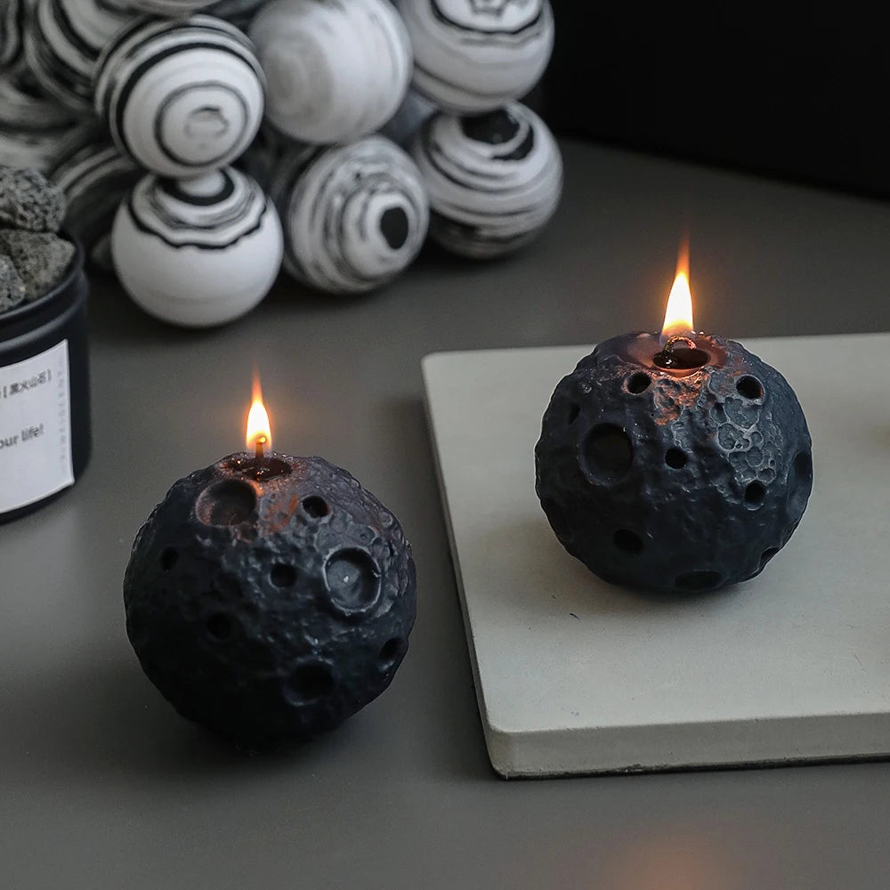 LAQTA creative lunar-shaped scented candle with a soft glow, showcasing its unique moon design in a cozy setting.