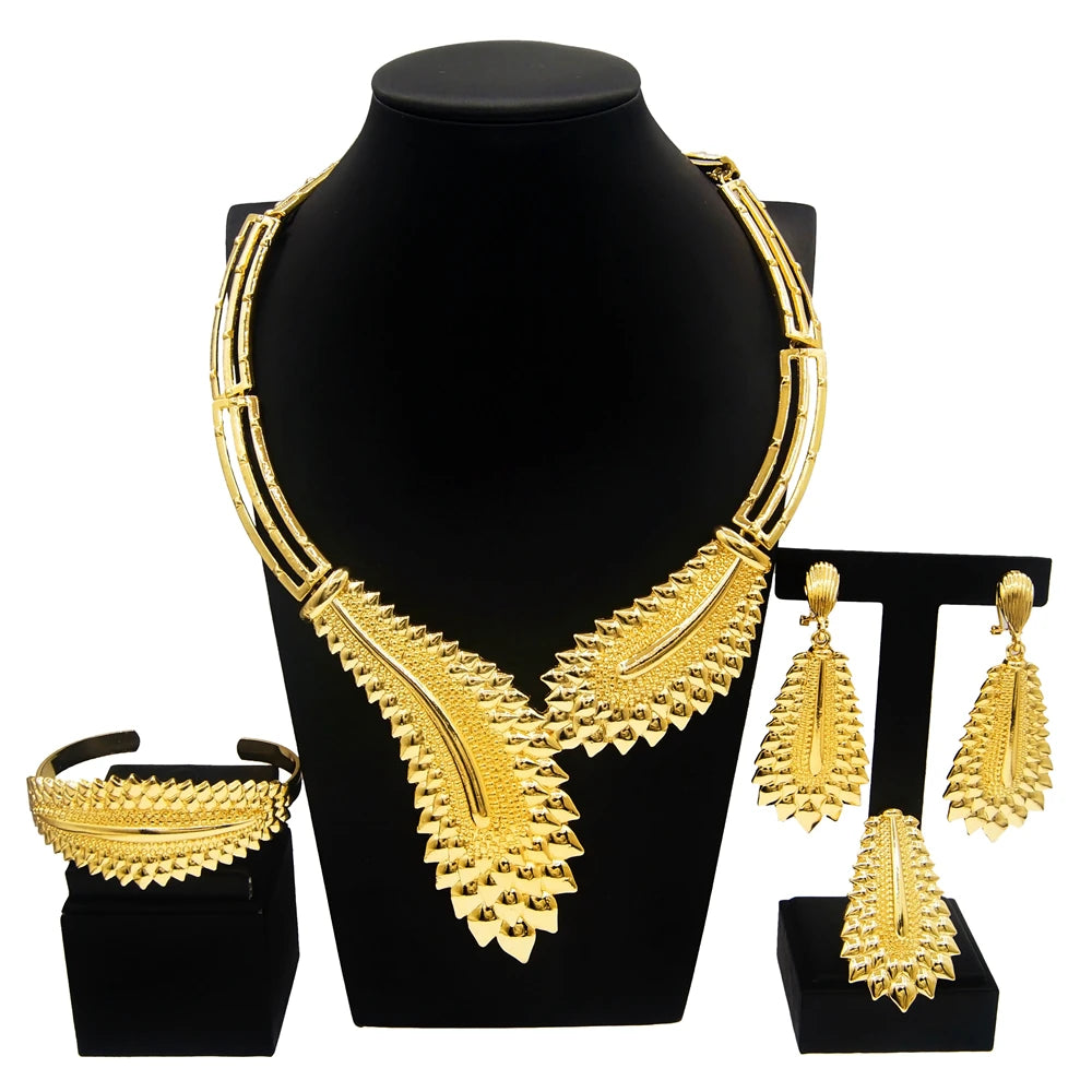 Dubai gold plated jewelry set by LAQTA featuring intricate necklace, earrings, and matching accessories with elegant design.