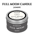 Waning Moon scented candle by LAQTA, featuring a sleek glass container with a softly glowing candle inside.