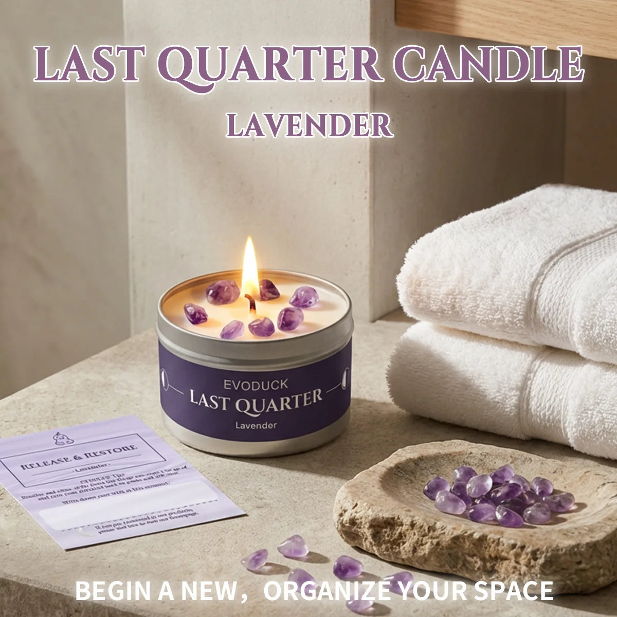 LAQTA Waning Moon scented candle in a glass jar with a soft, glowing flame and a moon-themed design on the label.