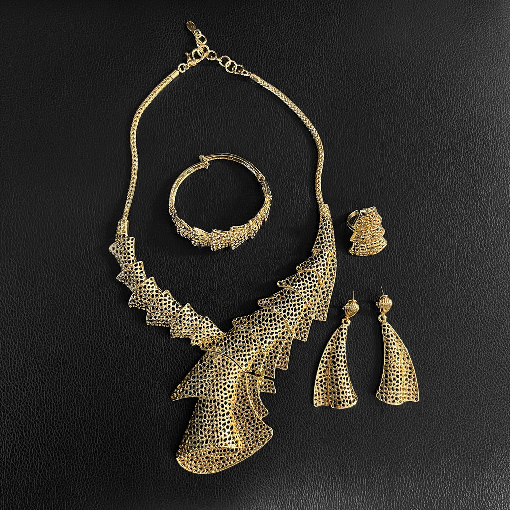 Elegant LAQTA fashion jewelry for women featuring stylish, intricate design with shiny gold and gemstone accents.