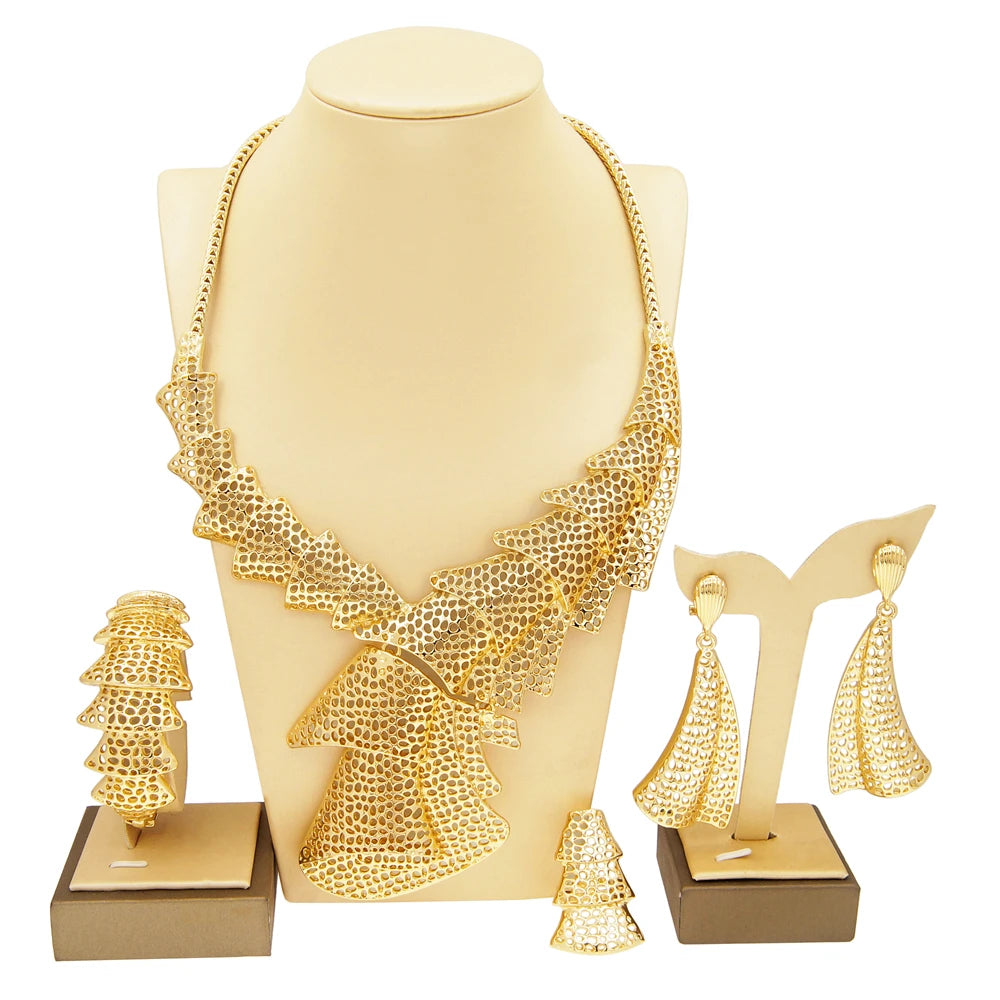 Elegant fashion woman jewelry by LAQTA featuring a stylish necklace and earrings on a neutral background.