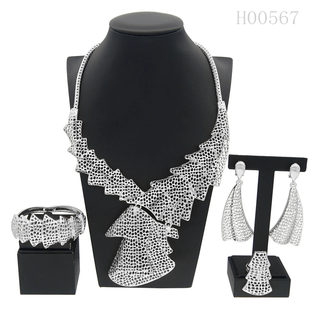 Elegant fashion woman jewelry by LAQTA featuring a stylish necklace with intricate design and silver-tone finish.