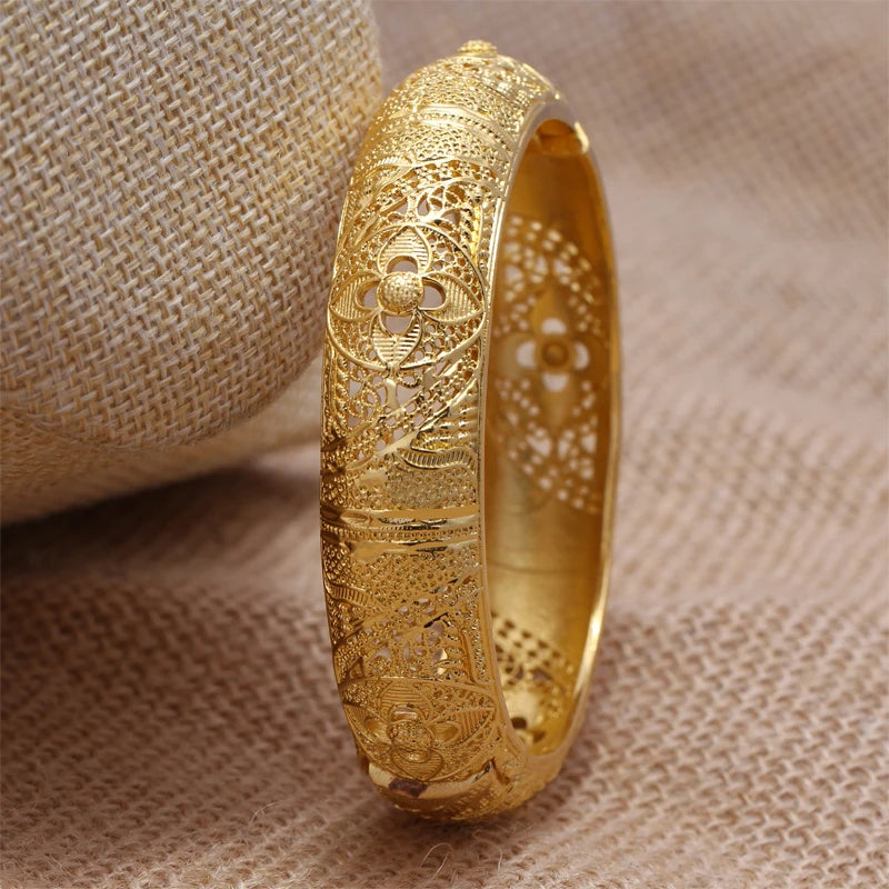 LAQTA 24k Dubai gold color bangles featuring intricate design and shiny gold finish, perfect for elegant traditional jewelry.
