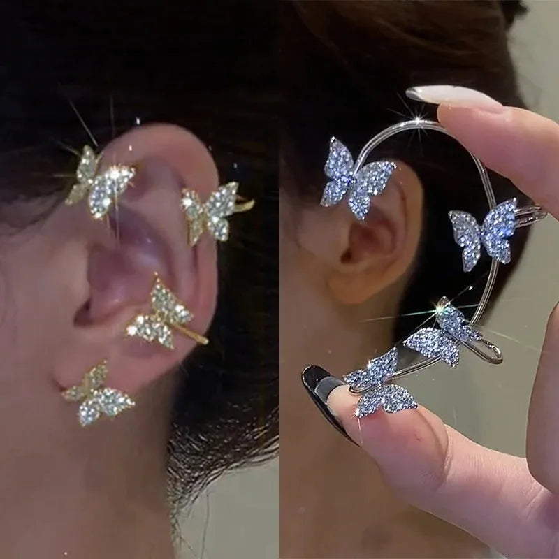 LAQTA Korean style butterfly ear clips featuring delicate butterfly designs on shiny metal with secure clip-on backs.