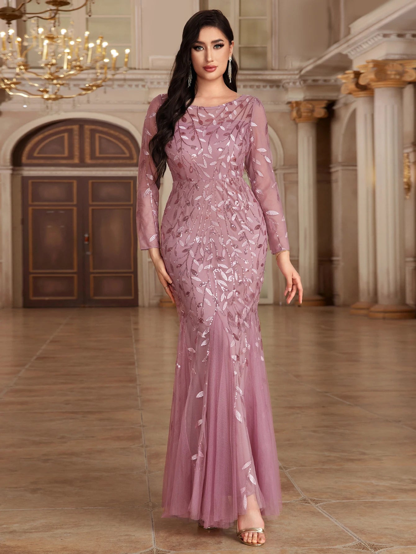 Elegant mermaid evening dress by LAQTA featuring shimmering fabric and a fitted silhouette for formal occasions.