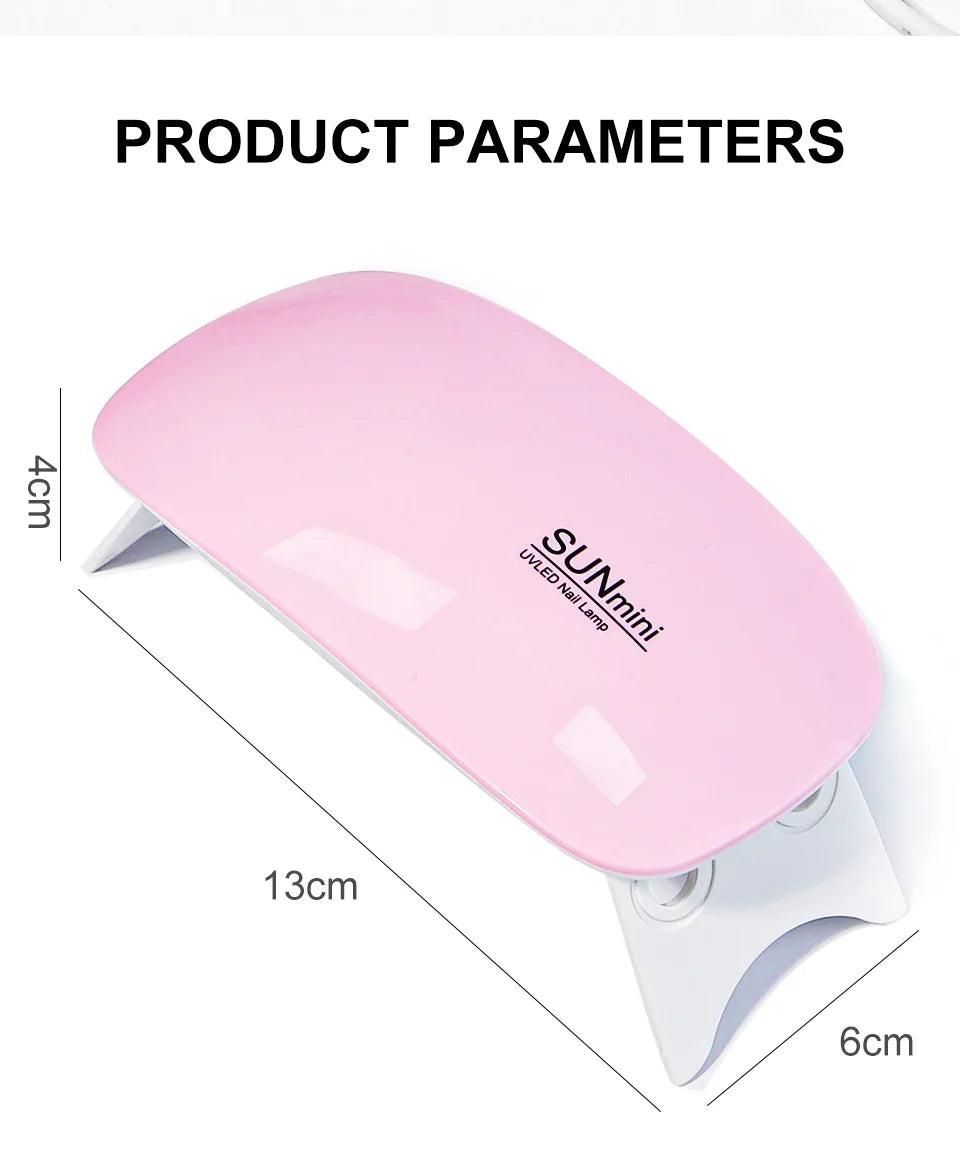 LAQTA portable nail dryer shown on a table, compact design, with LED display for quick, efficient nail drying at home or on the go.