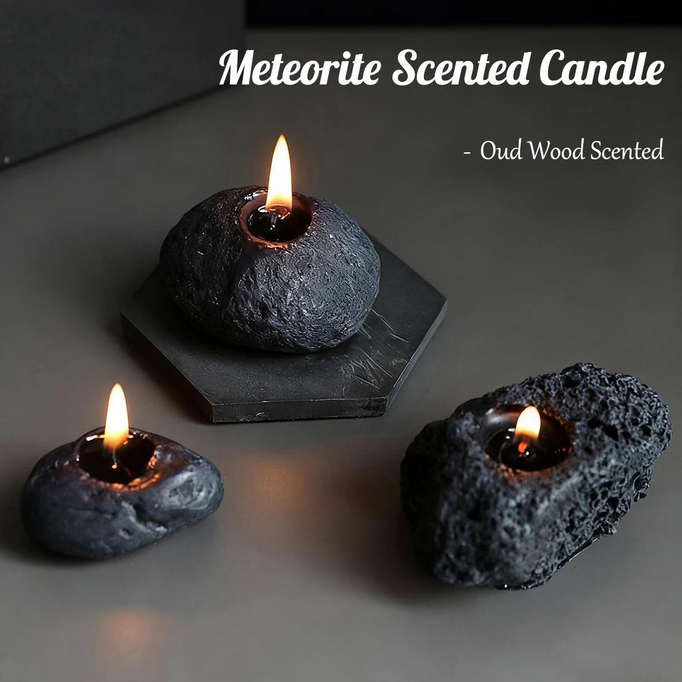 LAQTA Meteorite scented candle in a sleek glass jar with a textured surface, emitting a warm, inviting glow.