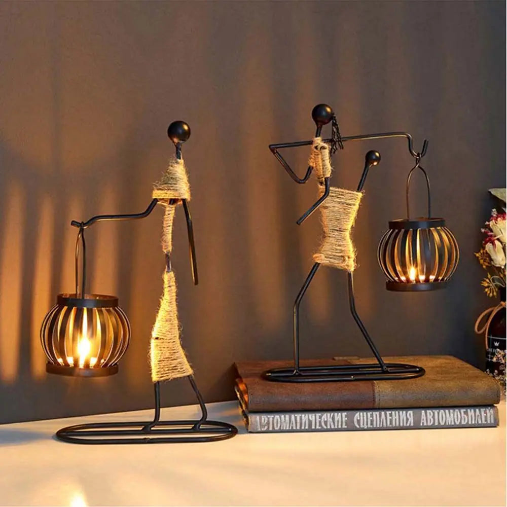 Nordic Metal Candlestick by LAQTA featuring a sleek, modern design with a tall, cylindrical shape and minimalist metallic finish.