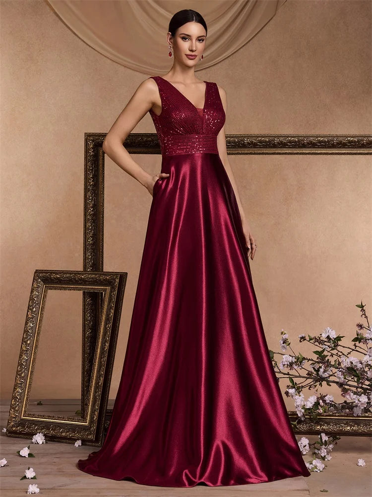 Elegant sequins evening dress by LAQTA featuring a fitted silhouette and shimmering embellishments.