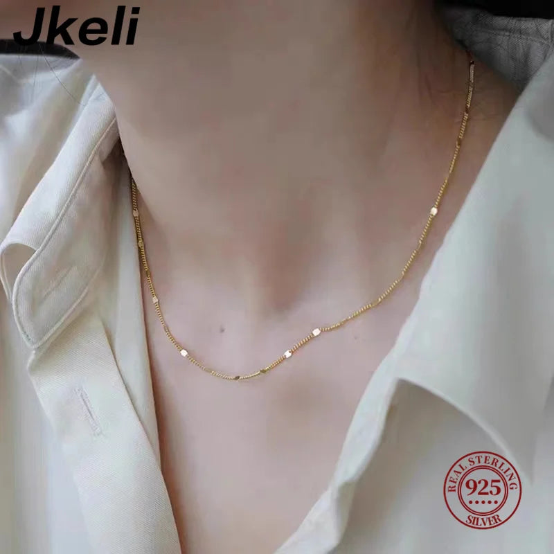 Sterling silver women's necklace by LAQTA featuring a delicate chain and elegant design.