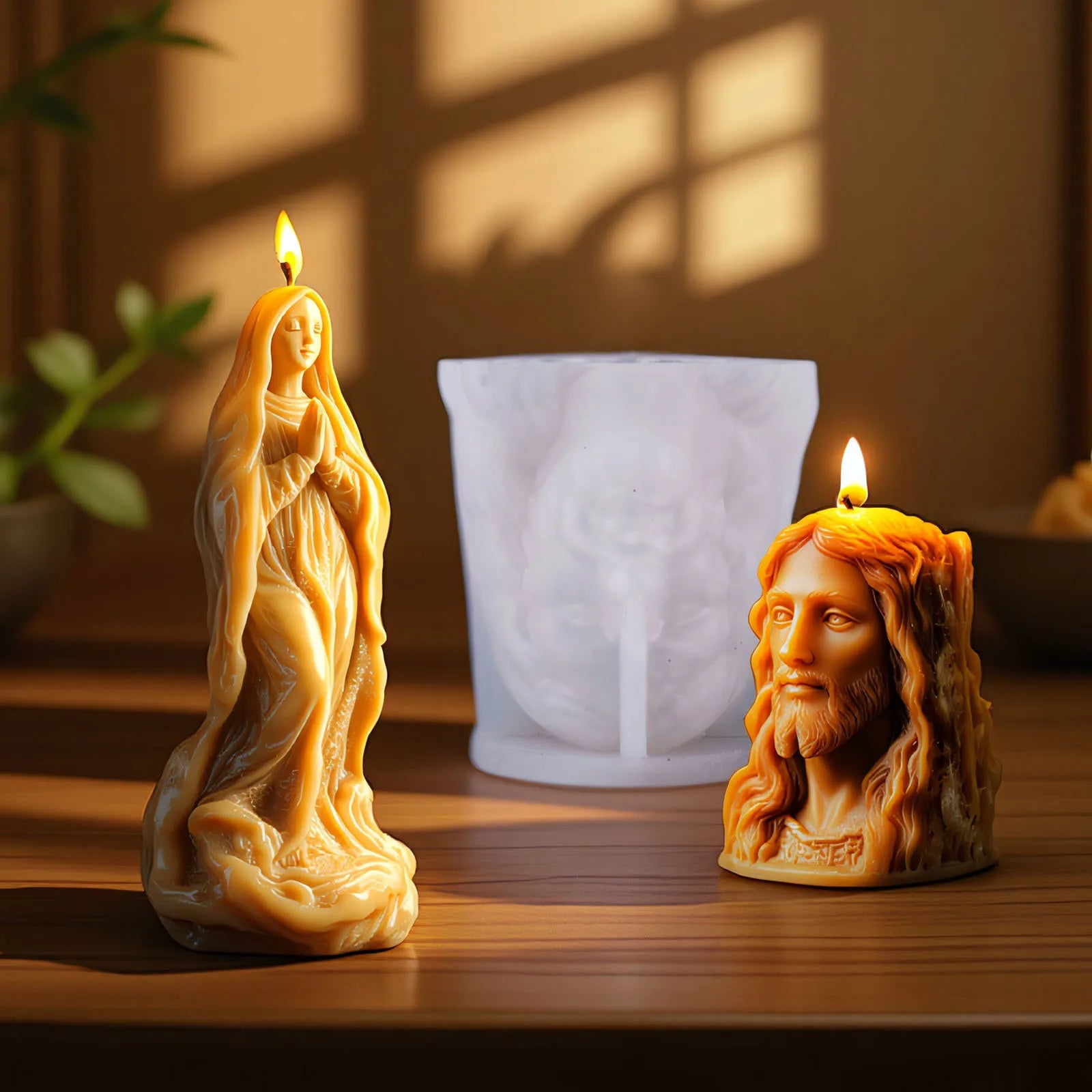 Silicone candle mold in Jesus statue design by LAQTA, showing the detailed interior cavity for candle casting.