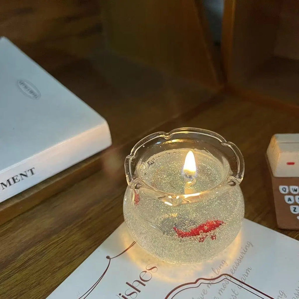 LAQTA Bubble Fish Tank goldfish aromatherapy candle featuring a decorative fish design on a sleek candle holder.