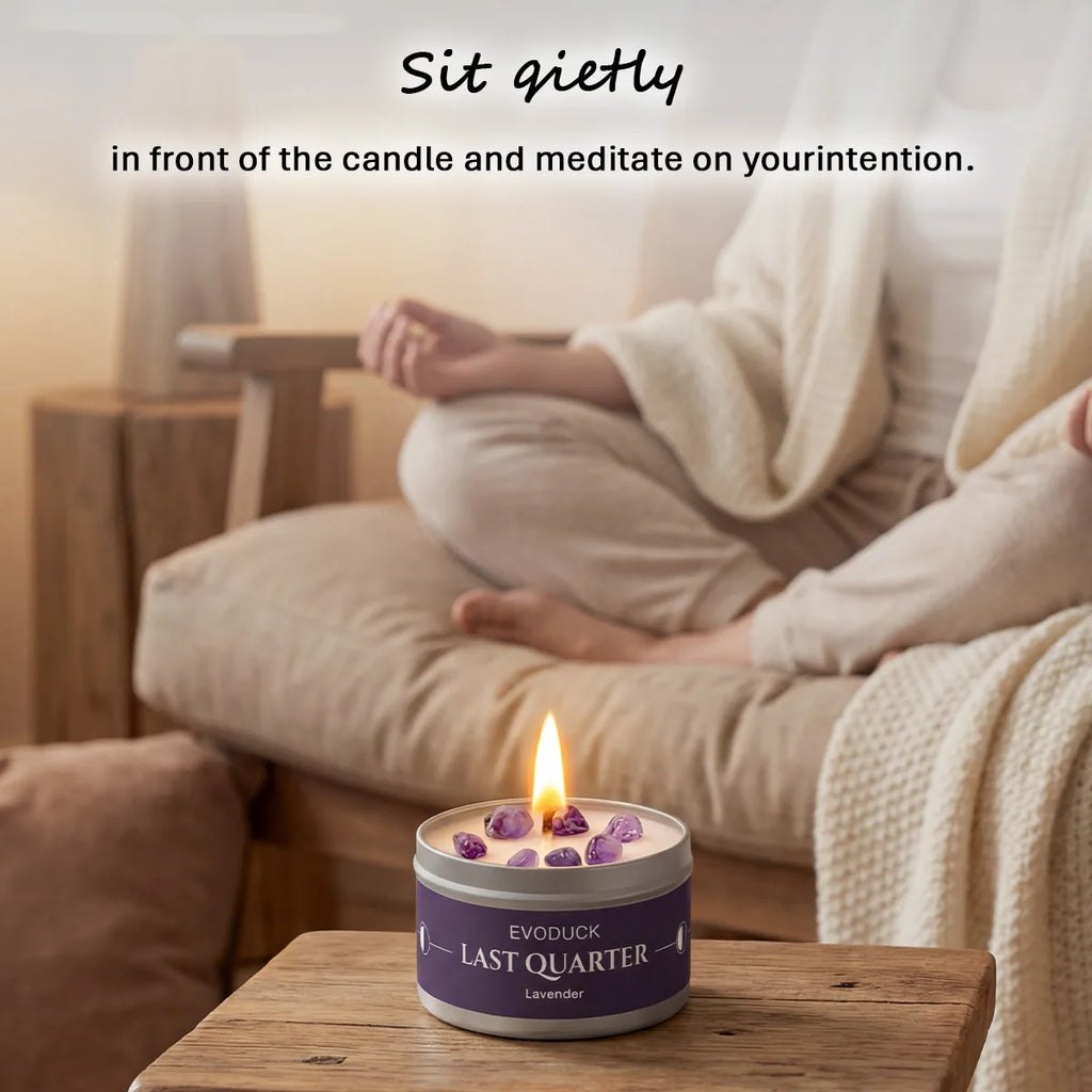 LAQTA Waning Moon scented candle in a glass jar with a moon design, emitting a warm, calming glow for cozy ambiance.