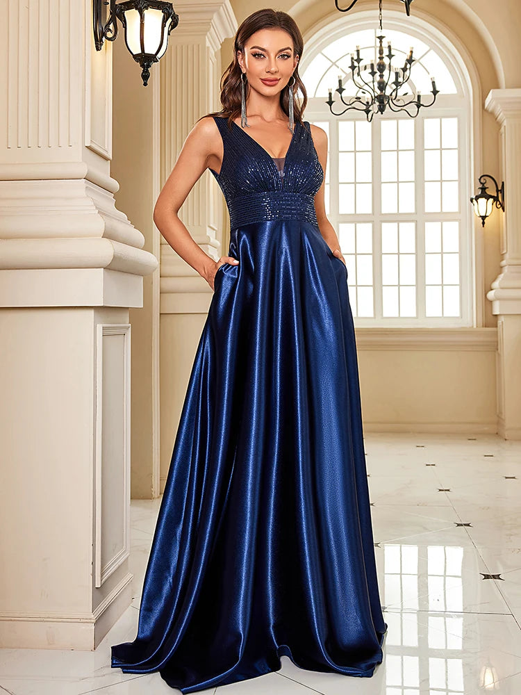 Elegant sequins evening dress by LAQTA featuring a fitted silhouette and shimmering embellishments.