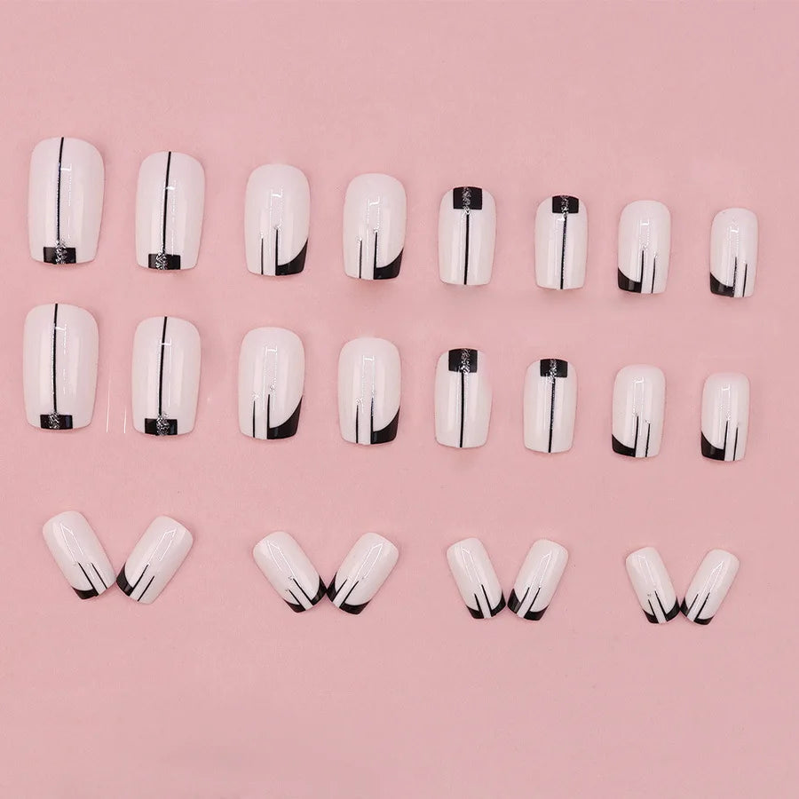 Short square fake nails by LAQTA with a sleek, polished finish, displayed on a neutral background.