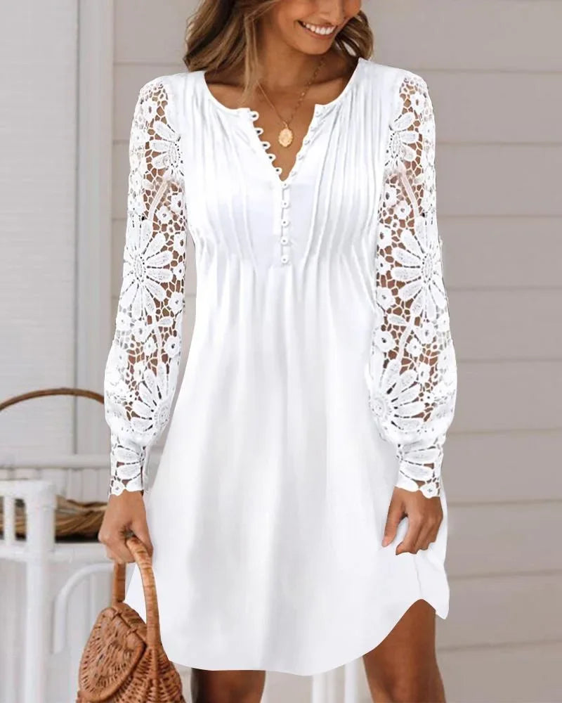 Elegant summer dress by LAQTA featuring lightweight fabric, floral print, and sleeveless design perfect for warm weather.