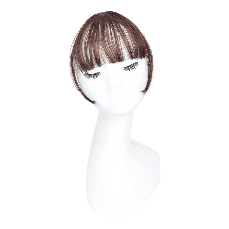 Synthetic invisible hair bangs by LAQTA, showing natural-looking, seamless hairpieces with a focus on the bangs' realistic texture and color.