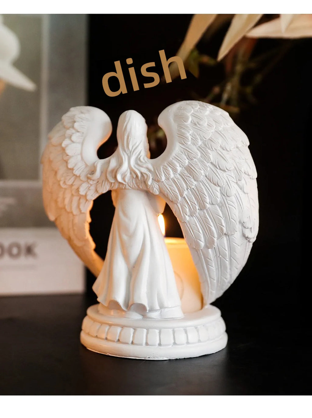 White angel candle holder by LAQTA featuring a detailed angel design and a space for a candle.