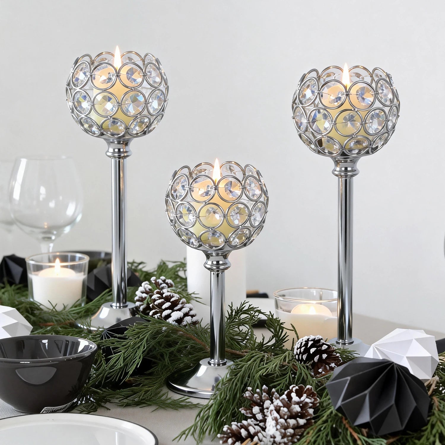 Elegant gold and silver metal glass candle by LAQTA with a sleek design and decorative glass holder.