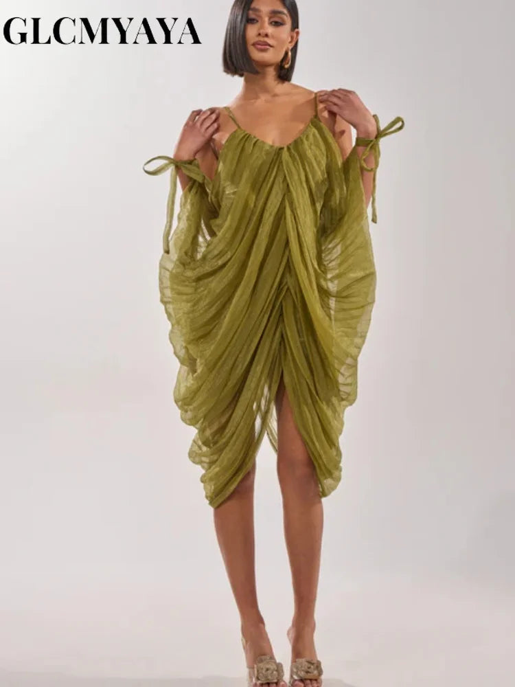 LAQTA sheer mesh dress with draped design and plunging neckline, showcasing a stylish and elegant eveningwear look.