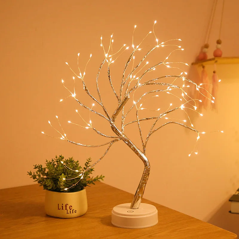 LED Rose Leaf Table Lamp by LAQTA, featuring a delicate rose leaf design with warm LED lighting on a sleek table surface.