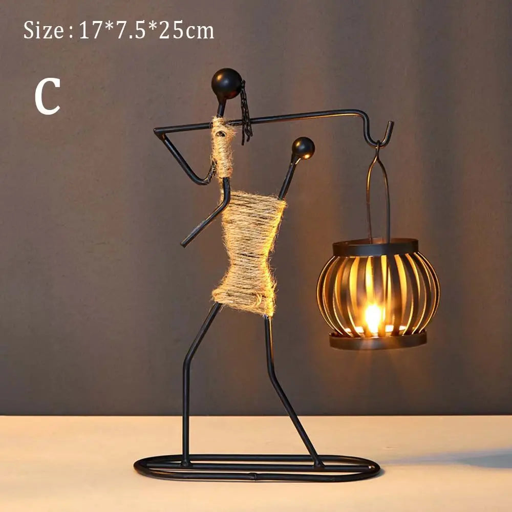 Nordic metal candlestick by LAQTA featuring a sleek, modern design with a tall, cylindrical shape and a wide base for stability.