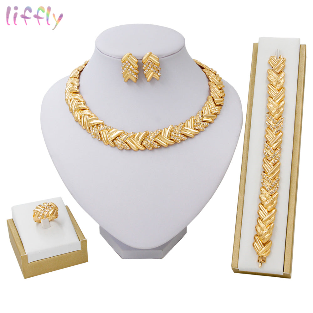 Elegant gold-colored bridal fashion jewelry from LAQTA, featuring intricate designs suitable for weddings in Dubai.
