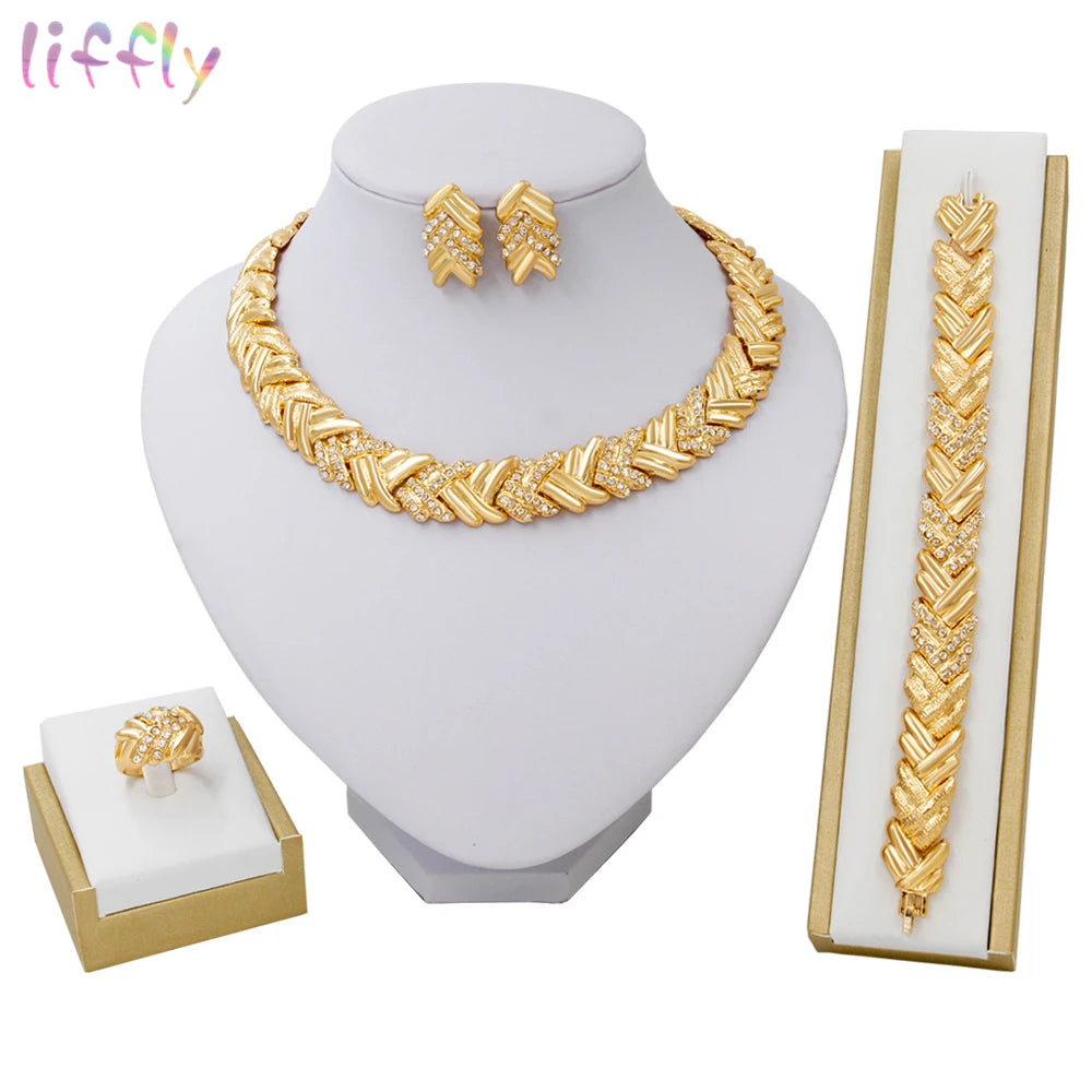 Elegant gold bridal jewelry set from LAQTA featuring intricate designs, perfect for traditional or wedding occasions.