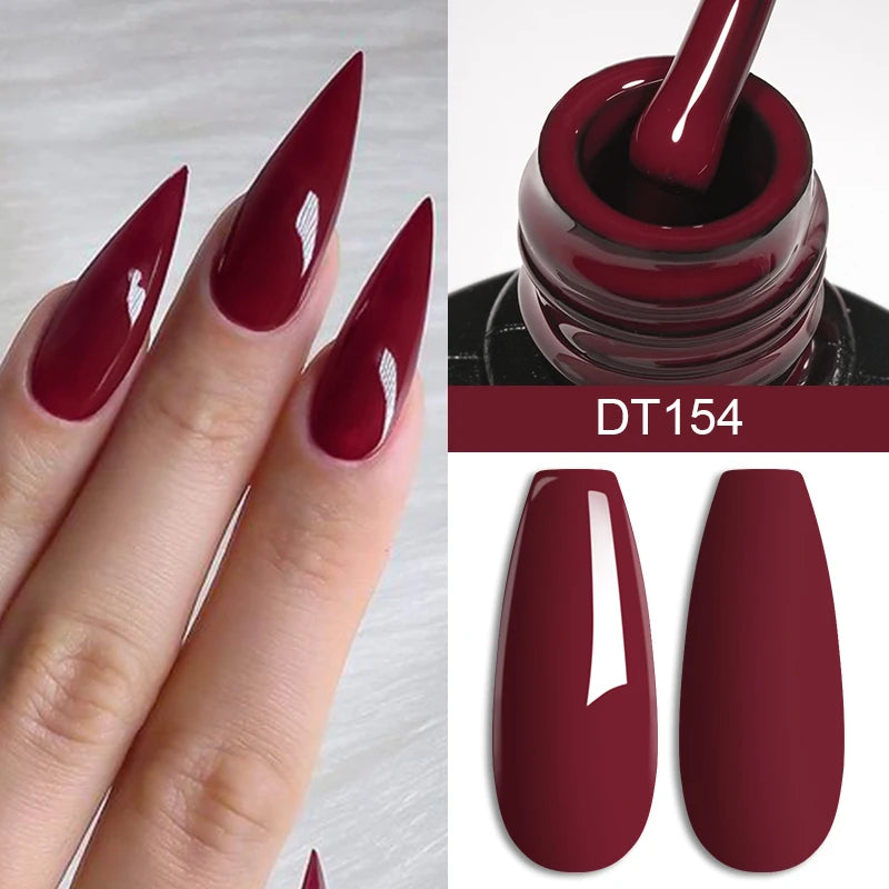 LAQTA Red Gel Nail Polish with crystal accents, showcasing a vibrant, glossy finish on well-manicured nails.