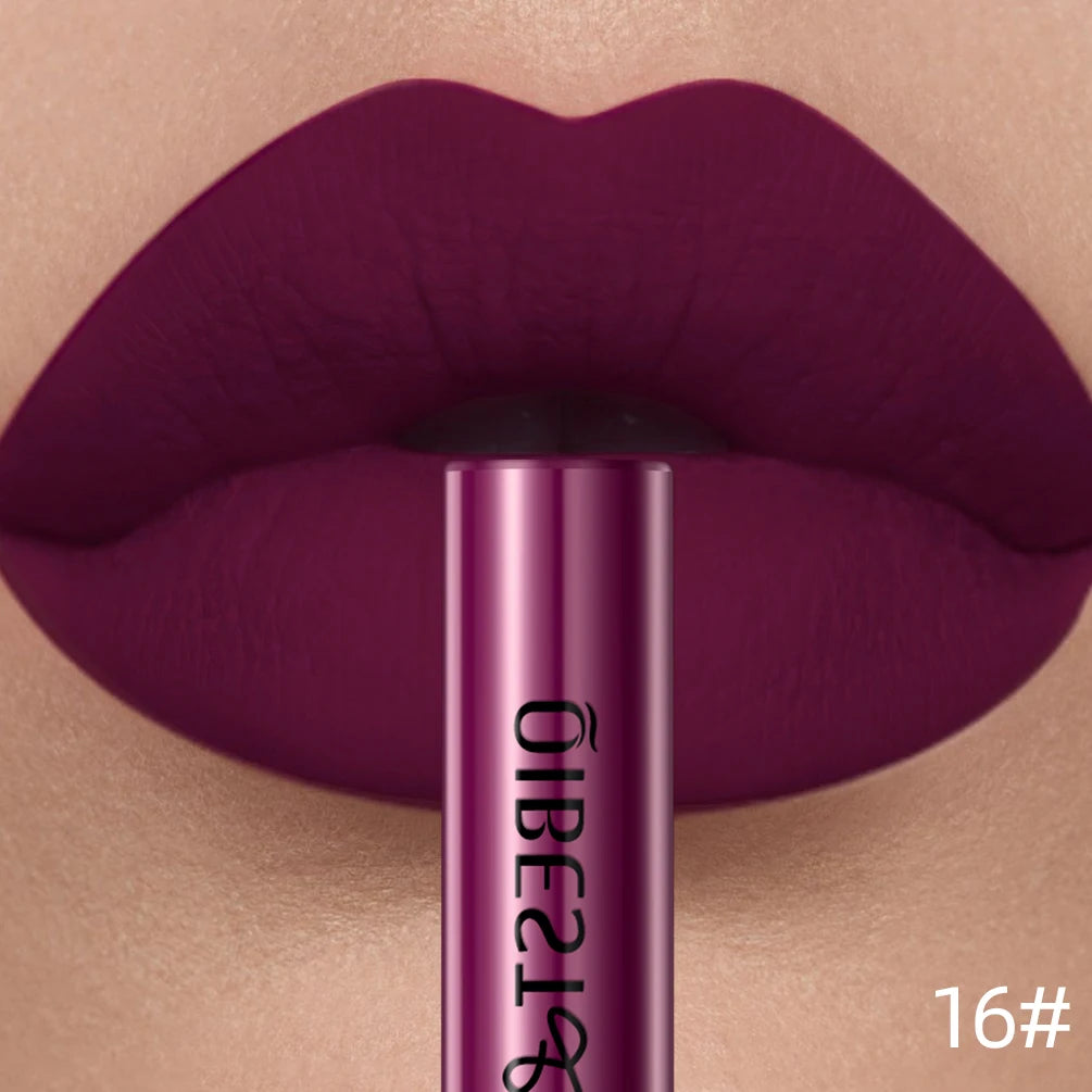 LAQTA matte liquid lipstick in a deep nude shade, displayed in a sleek tube with applicator visible.
