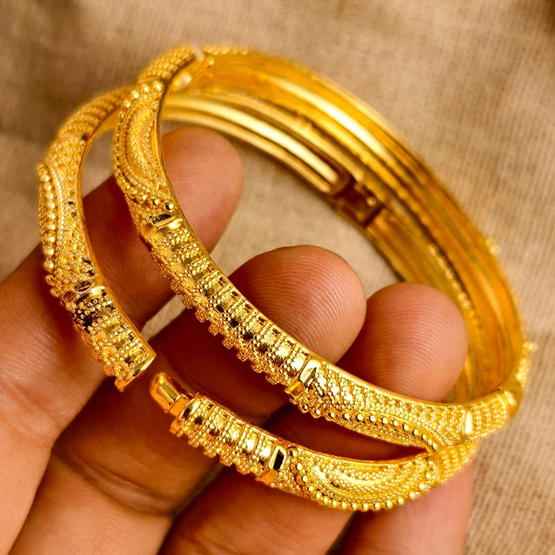 LAQTA 24k Dubai gold color bangles, shiny gold-tone jewelry set with intricate designs, perfect for traditional and modern wear