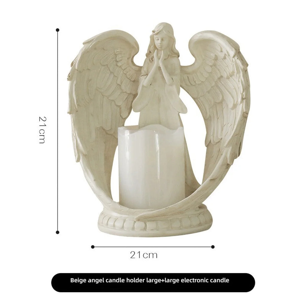 White angel-shaped candle holder by LAQTA featuring intricate detailing and a smooth finish, perfect for decorative candle display.