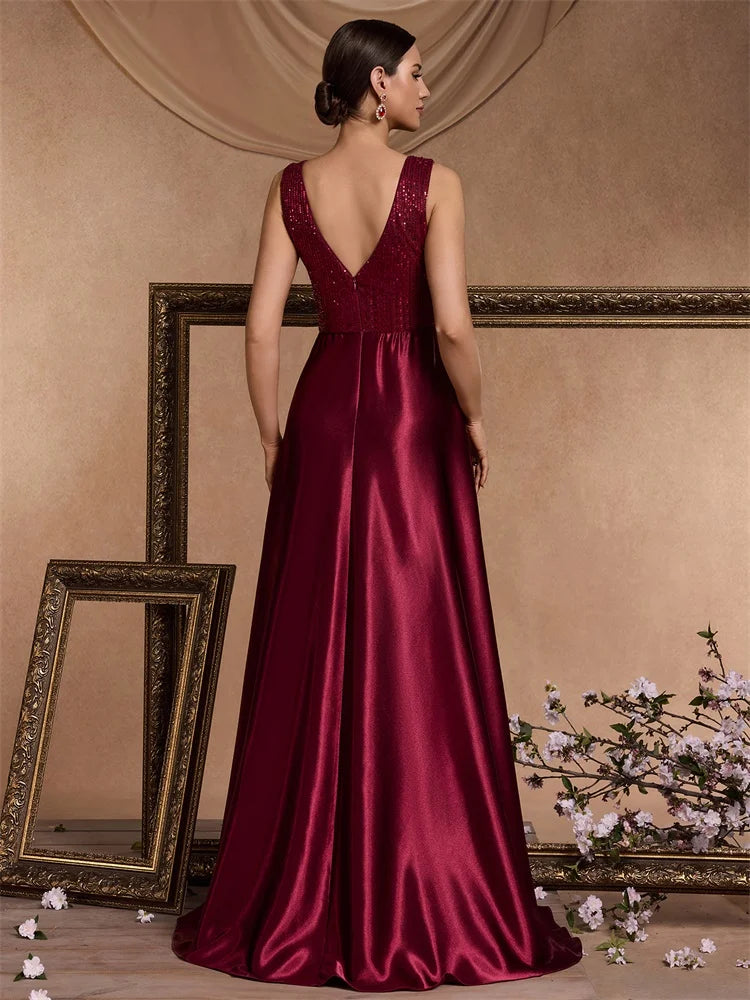 Elegant sequins evening dress by LAQTA featuring a fitted silhouette and shimmering embellishments for formal occasions.