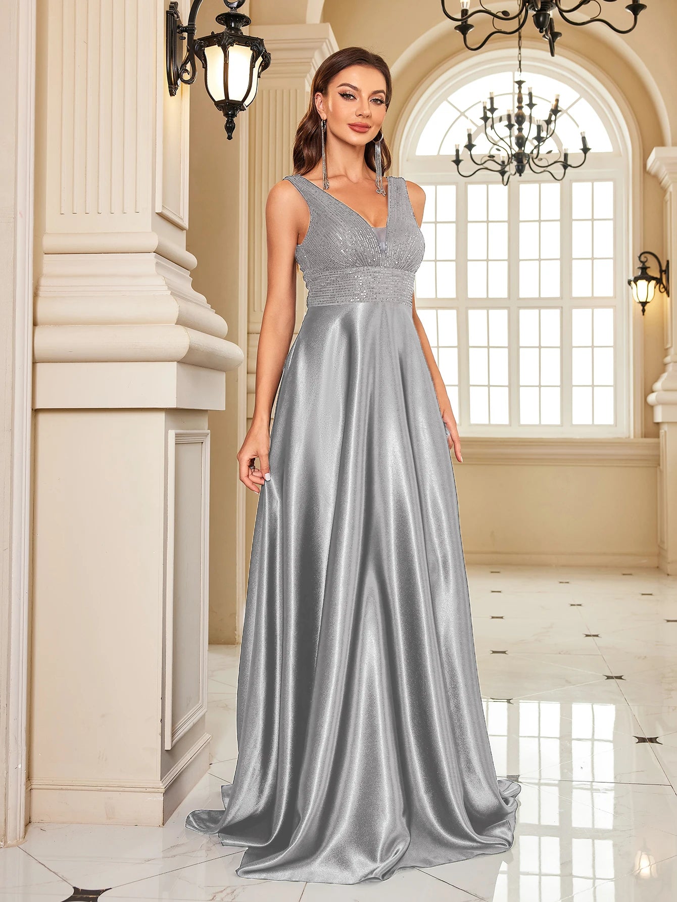 Elegant sequins evening dress by LAQTA featuring a fitted silhouette, shimmering sequins, and a sophisticated design.