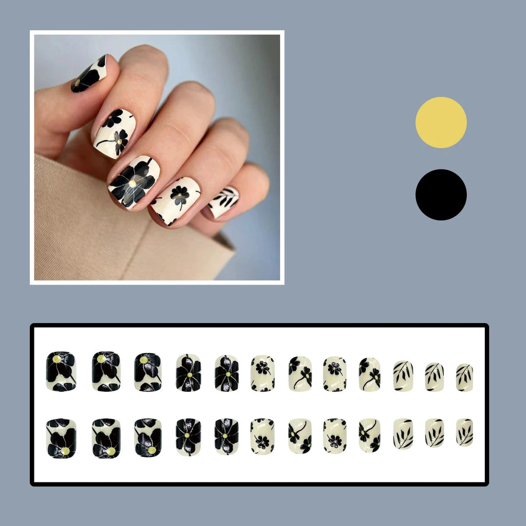 Short square fake nails by LAQTA, showcasing a stylish set with a smooth, glossy finish on a white background.