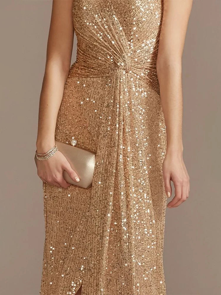 Elegant evening dress by LAQTA featuring a flowing fabric and intricate design, perfect for formal occasions.