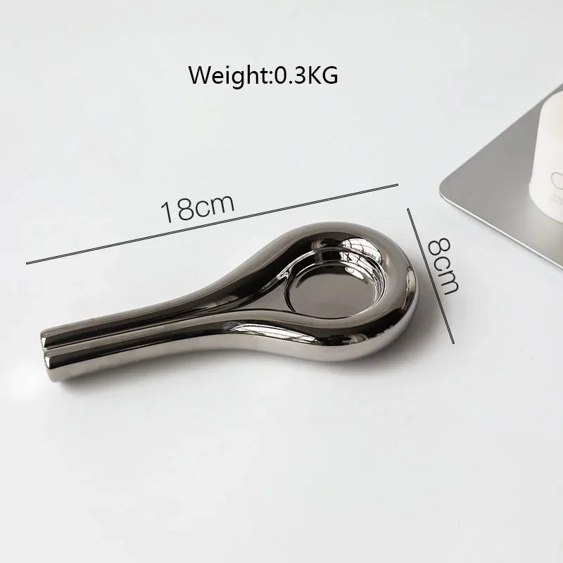 Luxury electroplating silver geometric ceramic candlestick by LAQTA, featuring a modern design and polished finish.