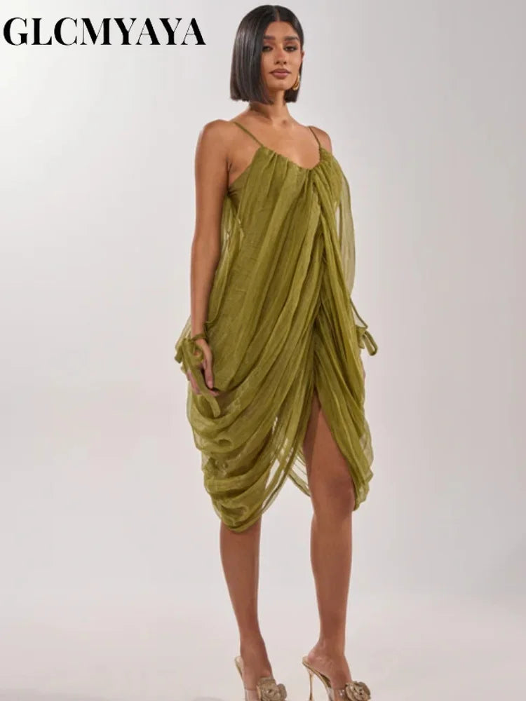 LAQTA sheer mesh dress with draped design and plunging neckline, showcasing elegant, semi-transparent fabric and stylish fit.