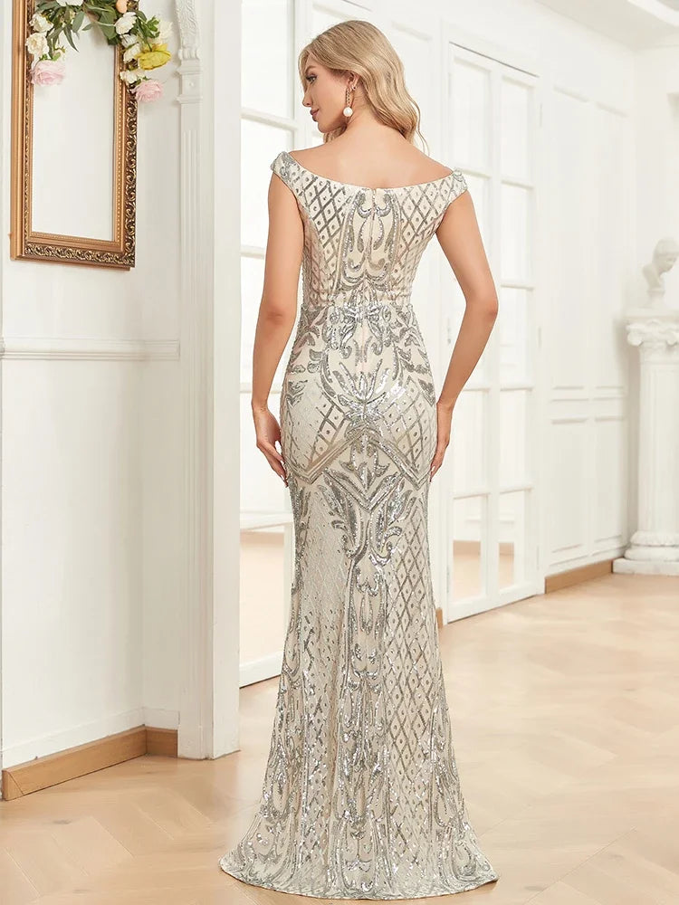 Elegant silver sequins evening dress with V neck design by LAQTA, featuring intricate embellishments for formal occasions.