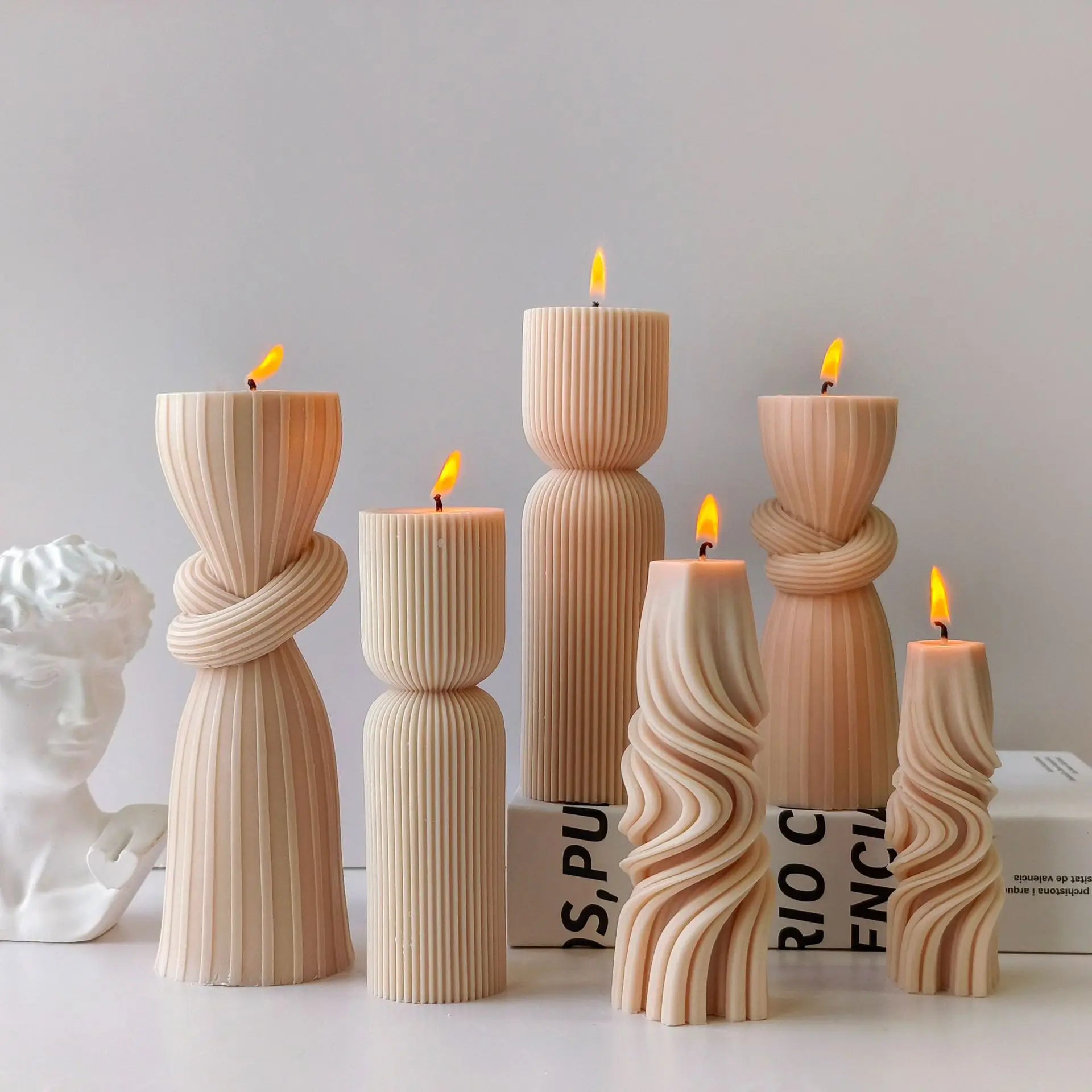 Striped cylinder aroma candle silicone mold by LAQTA, showing the detailed mold with striped pattern for candle making.