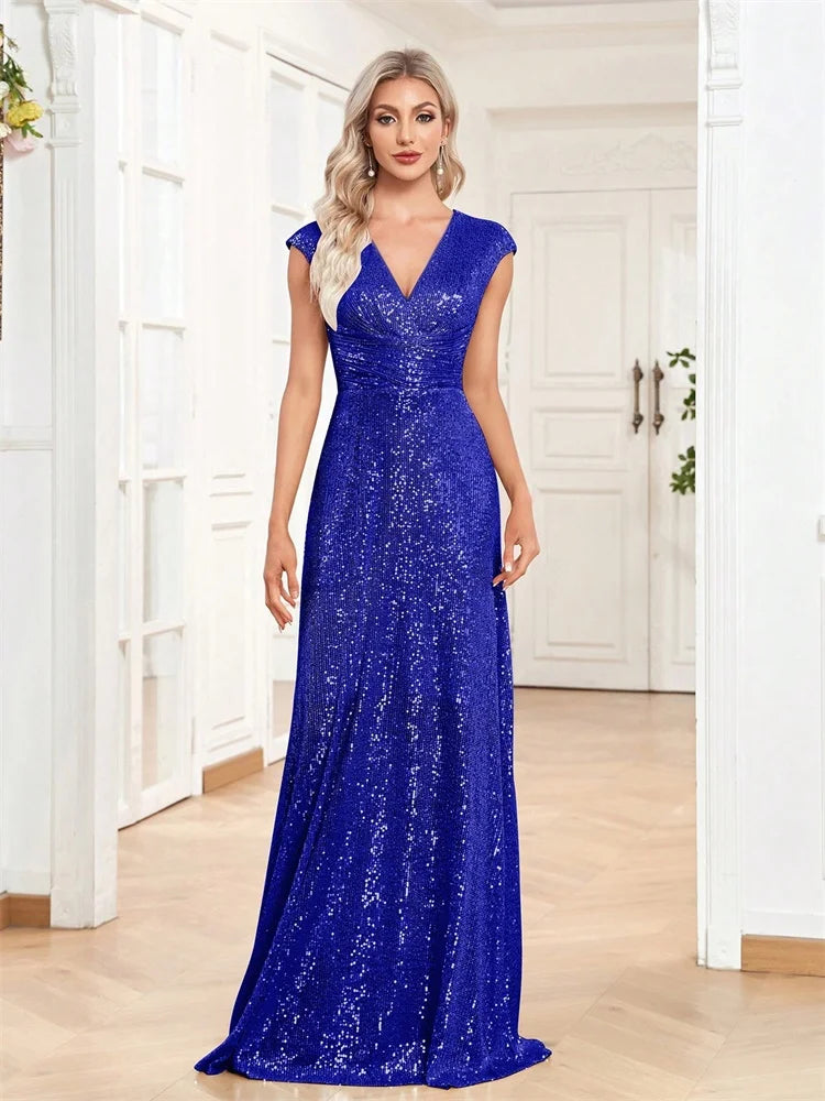 Elegant V-neck mermaid evening dress by LAQTA featuring a fitted silhouette and flowing fabric, shown on a model.