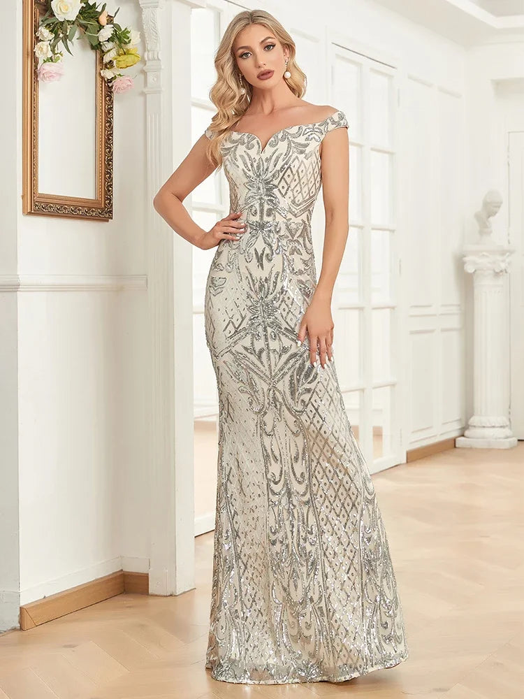 Elegant silver sequins evening dress with V-neck design by LAQTA, showcasing a stylish and sophisticated look for formal occasions.