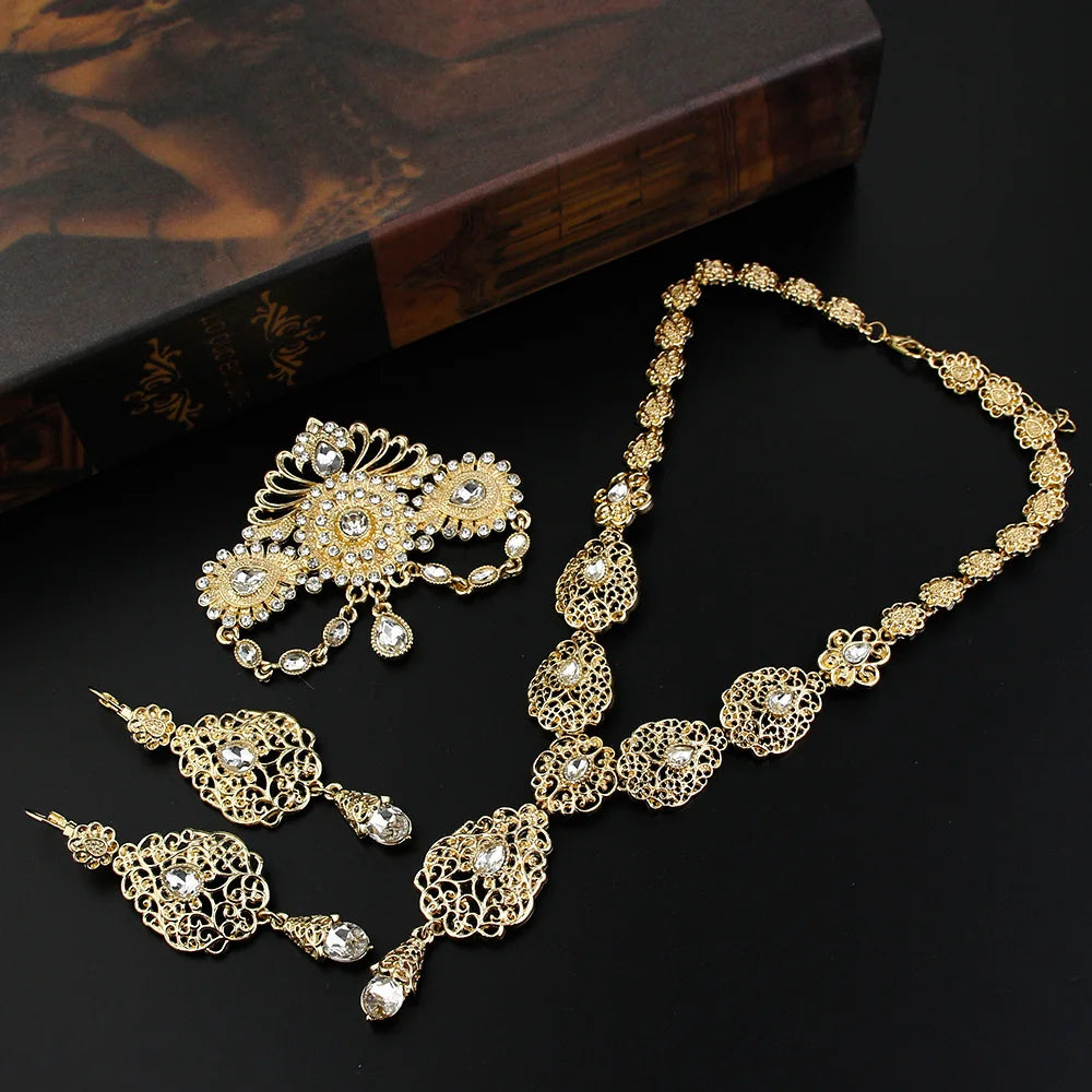 Elegant Morocco bride jewelry by LAQTA, featuring intricate gold and gemstone embellishments for traditional wedding attire.
