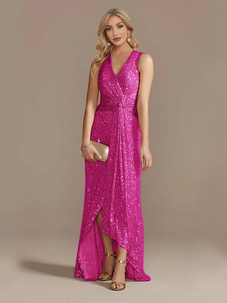 Elegant evening dress by LAQTA featuring a sleek, floor-length design with intricate detailing and a sophisticated silhouette.
