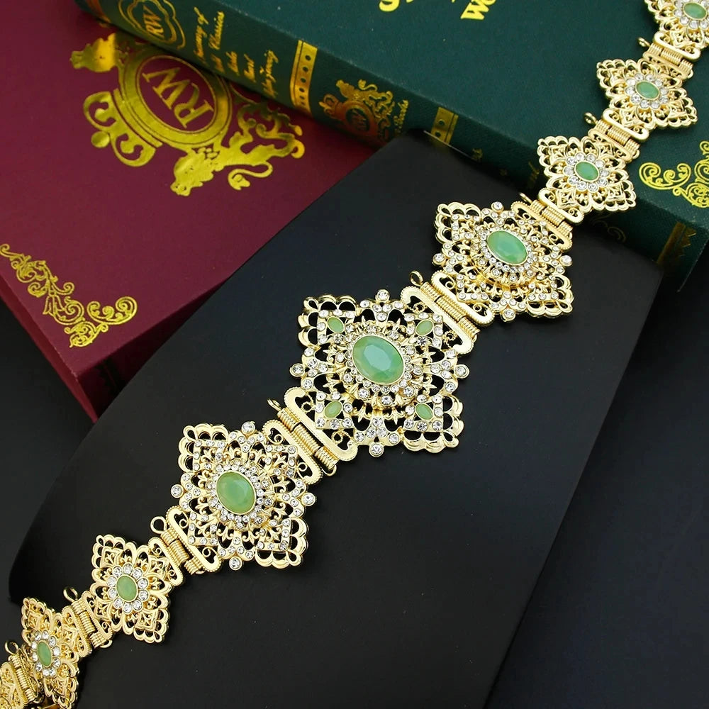 Elegant Arabic bride jewelry set by LAQTA featuring intricate gold and gemstone designs for special wedding occasions.
