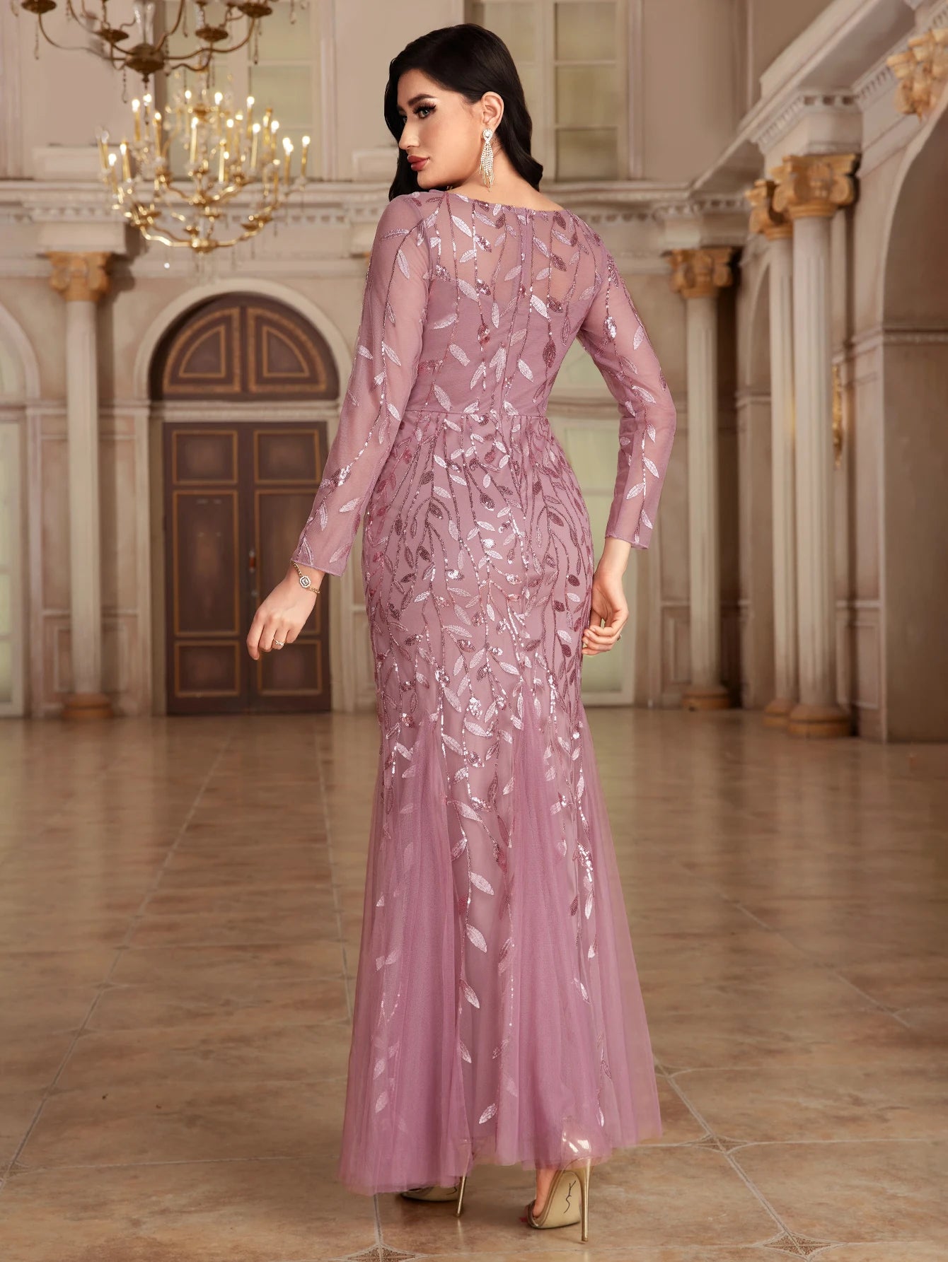Elegant mermaid evening dress by LAQTA, featuring shimmering fabric and fitted silhouette for formal occasions.