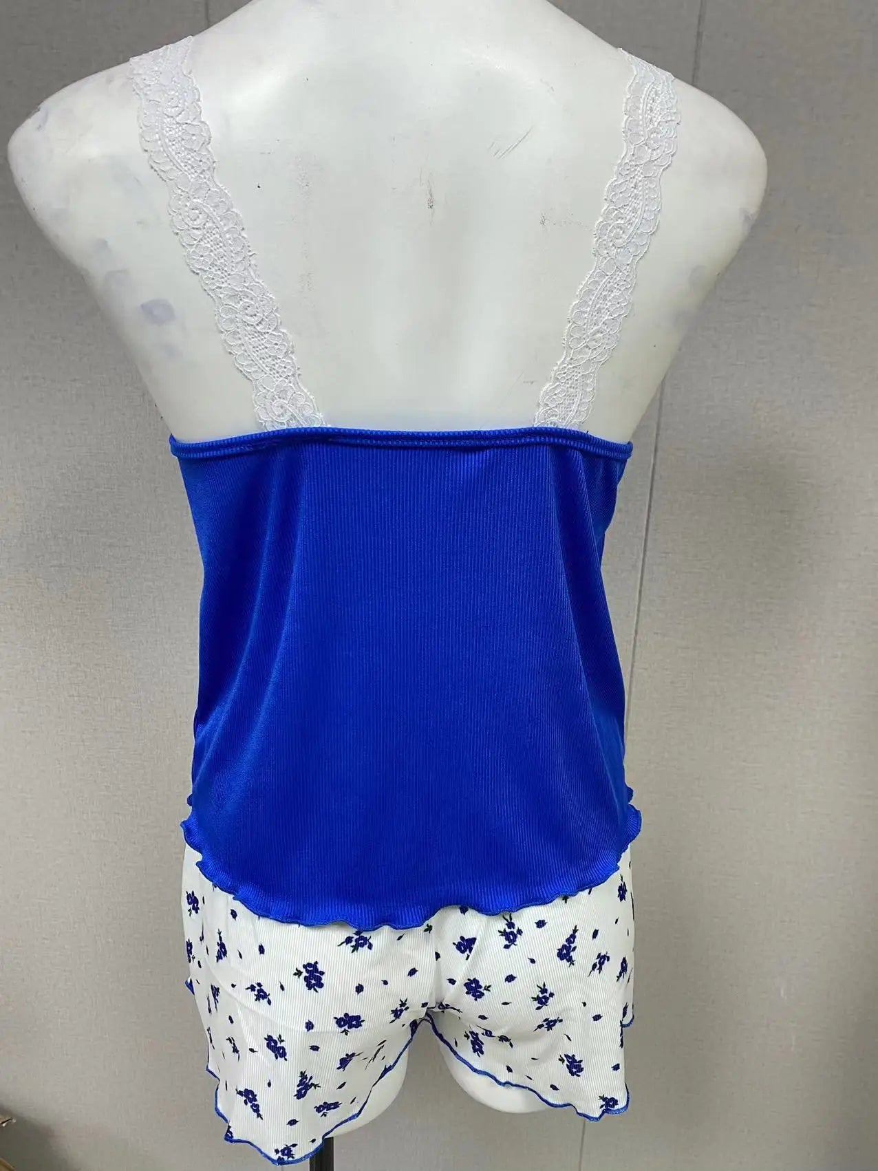 Women's lace lingerie set by LAQTA, featuring intricate lace details and a flattering fit, shown in a close-up view.