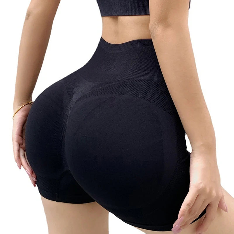 Light blue high waist shorts by LAQTA with a fitted design and stylish waistband, displayed on a neutral background.