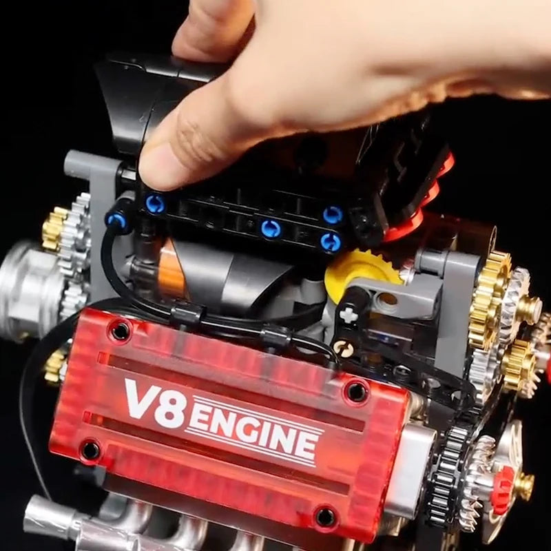 LAQTA V8 engine motorized simulation model showing detailed engine components and realistic design on a neutral background.